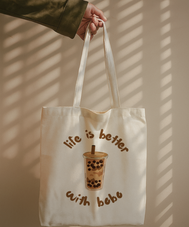 White canvas tote bag with 'Life is Better with Bobo' design
