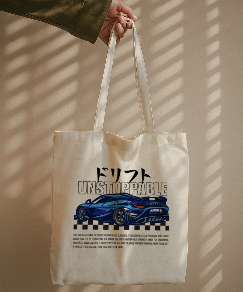 Unstoppable Drive Tote Bag with blue sports car and bold typography.