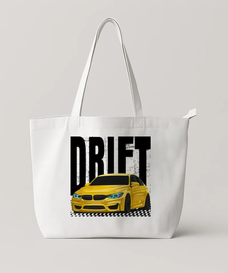 White tote bag with a yellow sports car graphic and bold DRIFT text.