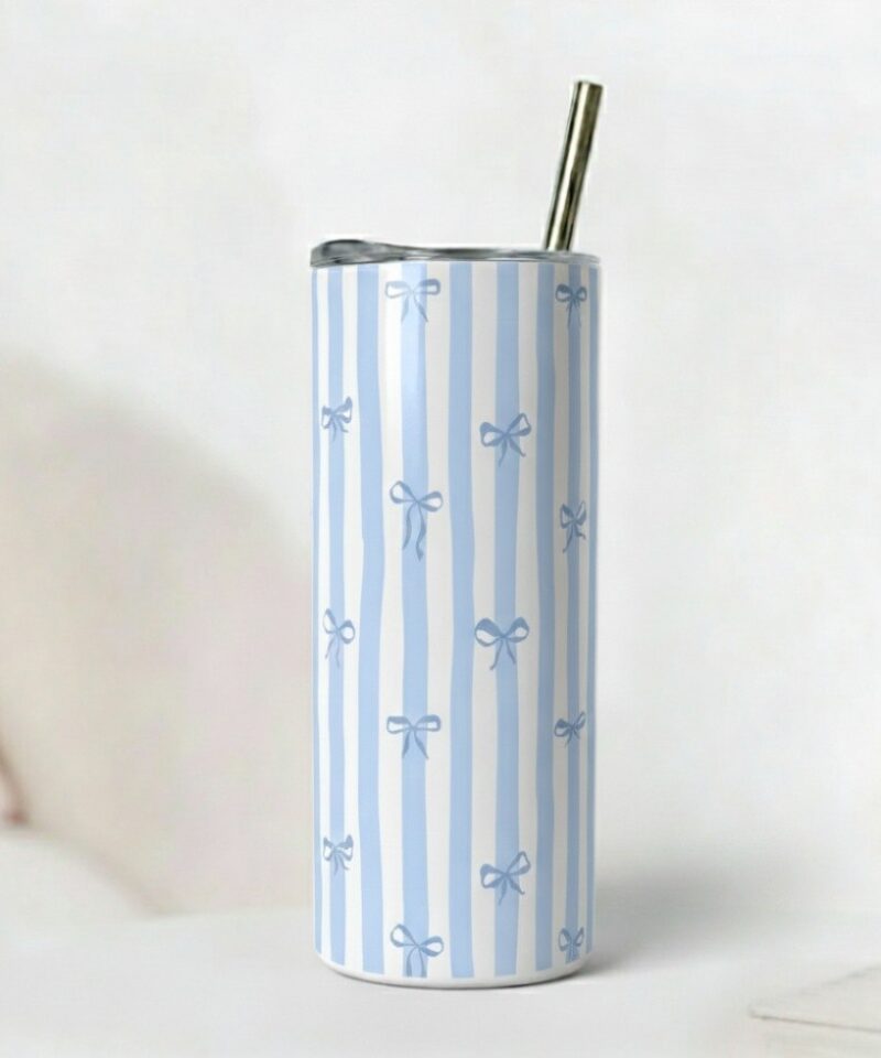 White tumbler with baby blue vertical stripes and small bow pattern