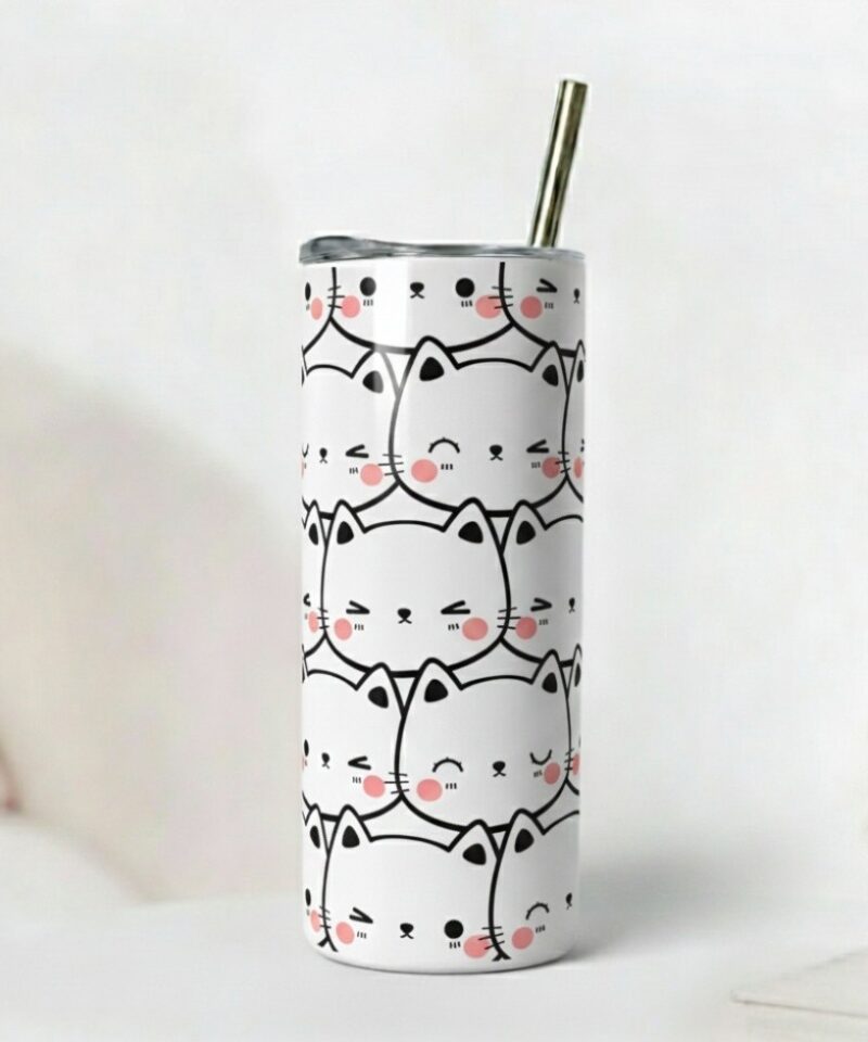 White tumbler covered with kawaii white cat faces with pink accents